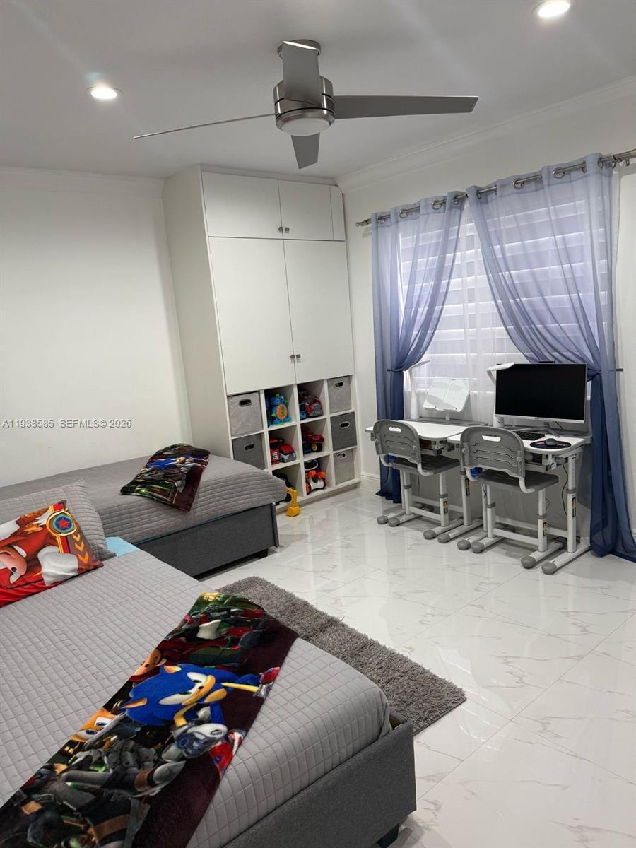 2837 West 75th Street Hialeah, FL 33018 - Photo 20 of 22 a bedroom with furniture and a window