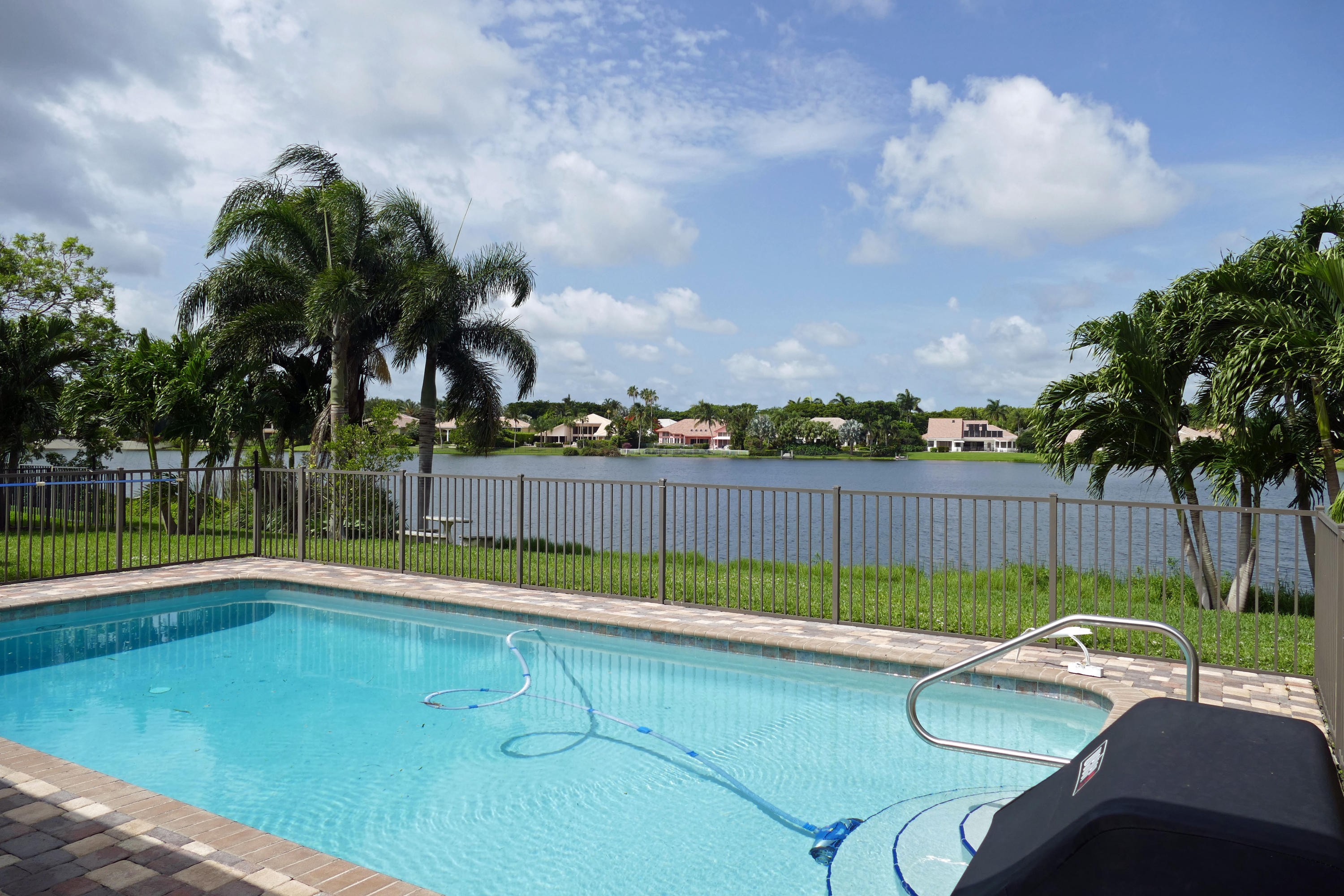 17391 Springtree Lane Boca Raton, FL 33487 - Photo 28 of 39 Pool & Lake View