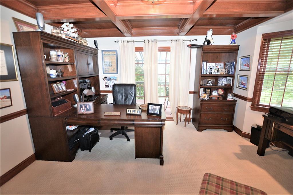10319 Ridgecrest Point Wexford, PA 15090 - Photo 11 of 24 Den with rich woodwork ceiling leads to private deck