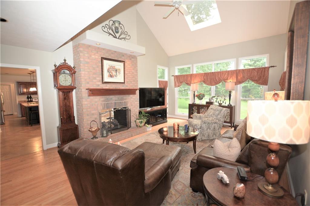 Family room w/wall of windows and skylight