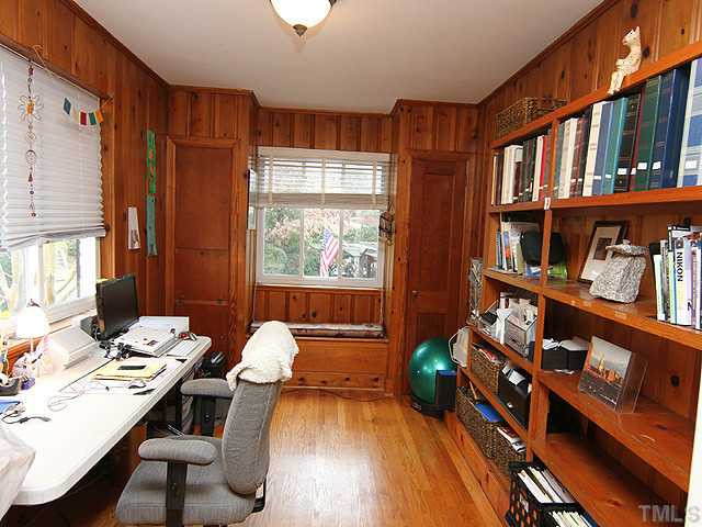 3015 Ruffin Street Raleigh, NC 27607 - Photo 12 of 25 Office with built in bookshelves, window seat, hardwood floors, and windows to enjoy looking onto your beautiuful landscaped yard. Other