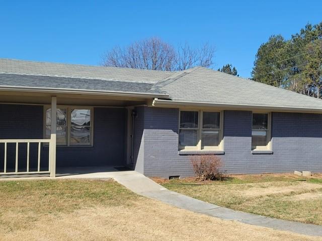 1063 Pleasant Hill Road, Unit A Lawrenceville, GA 30044 - Photo 3 of 18 a front view of a house