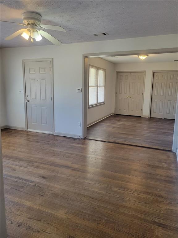 1063 Pleasant Hill Road, Unit A Lawrenceville, GA 30044 - Photo 4 of 18 a view of empty room with wooden floor