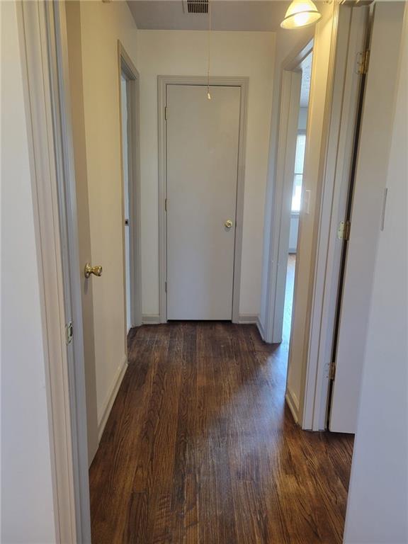1063 Pleasant Hill Road, Unit A Lawrenceville, GA 30044 - Photo 10 of 18 a view of a hallway with wooden floor