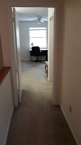 a view of livingroom with furniture and window