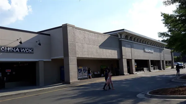 a view of a building with a patio