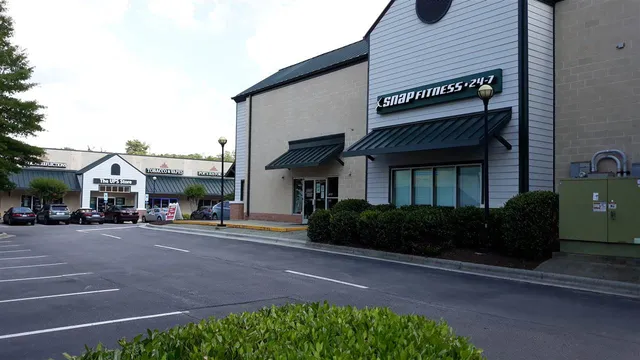 a view of a street with sitting area