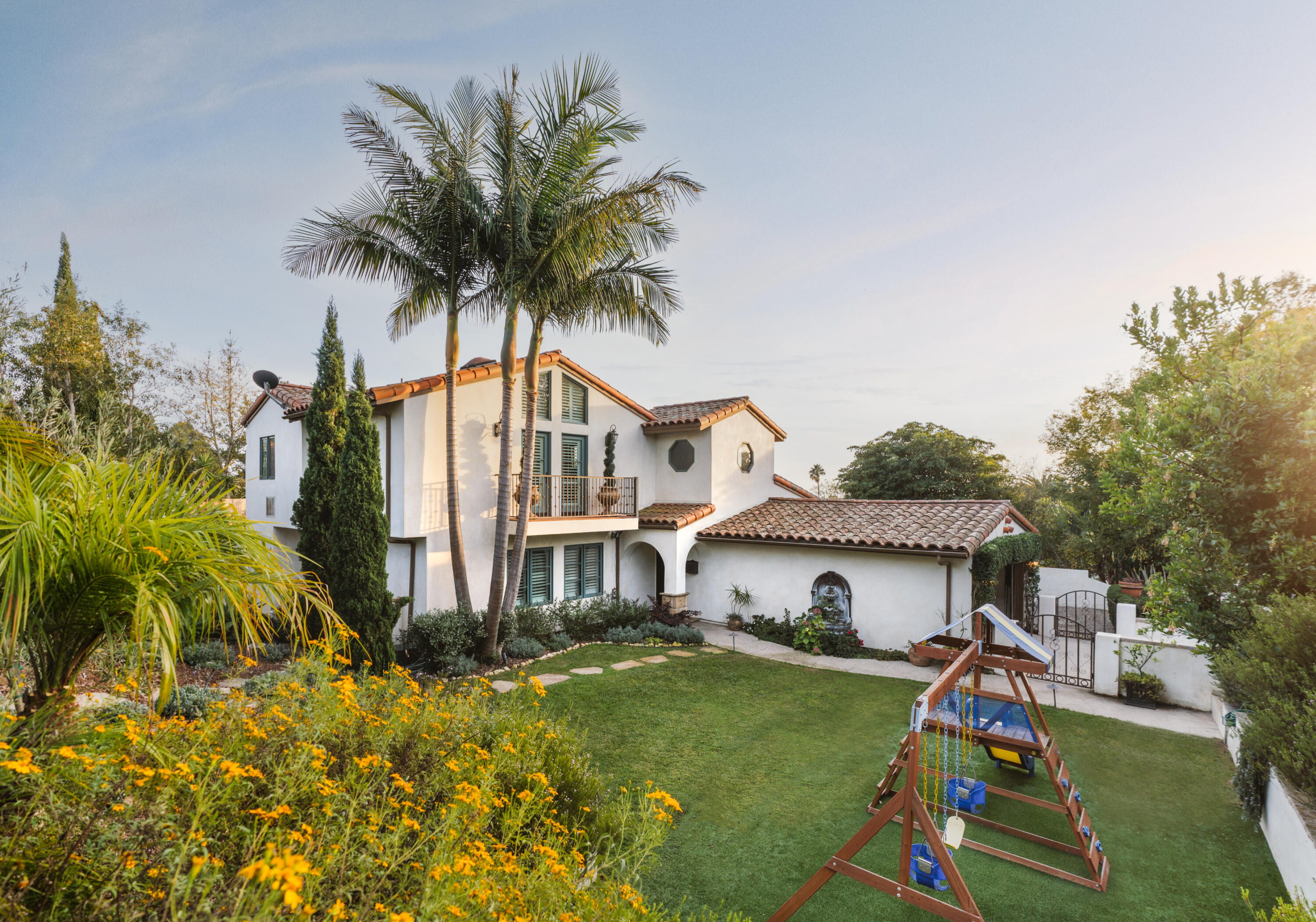 844 Meigs Road Santa Barbara, CA 93109 - Photo 2 of 32 a front view of house with yard and swimming pool