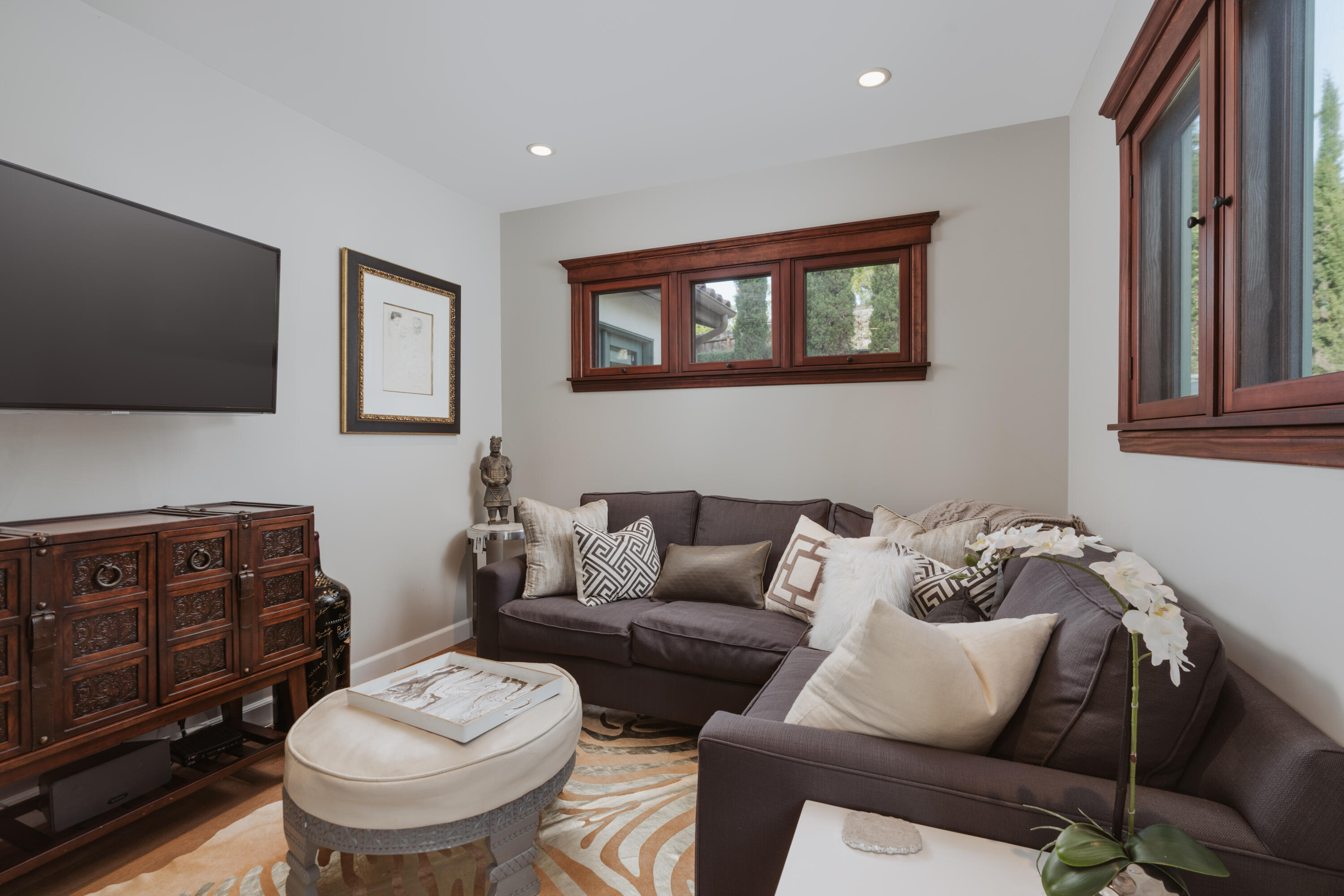 844 Meigs Road Santa Barbara, CA 93109 - Photo 23 of 32 a living room with furniture and a flat screen tv