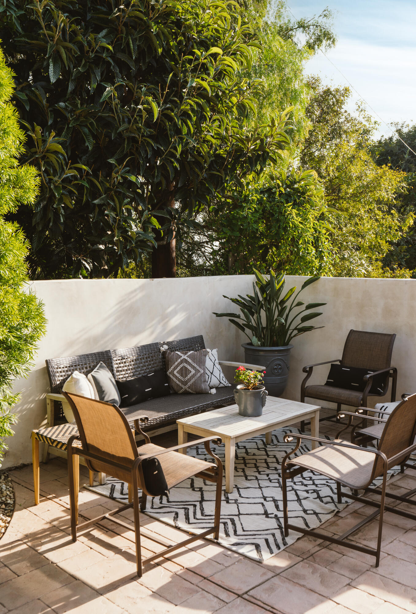 844 Meigs Road Santa Barbara, CA 93109 - Photo 26 of 32 a backyard of a house with table and chairs