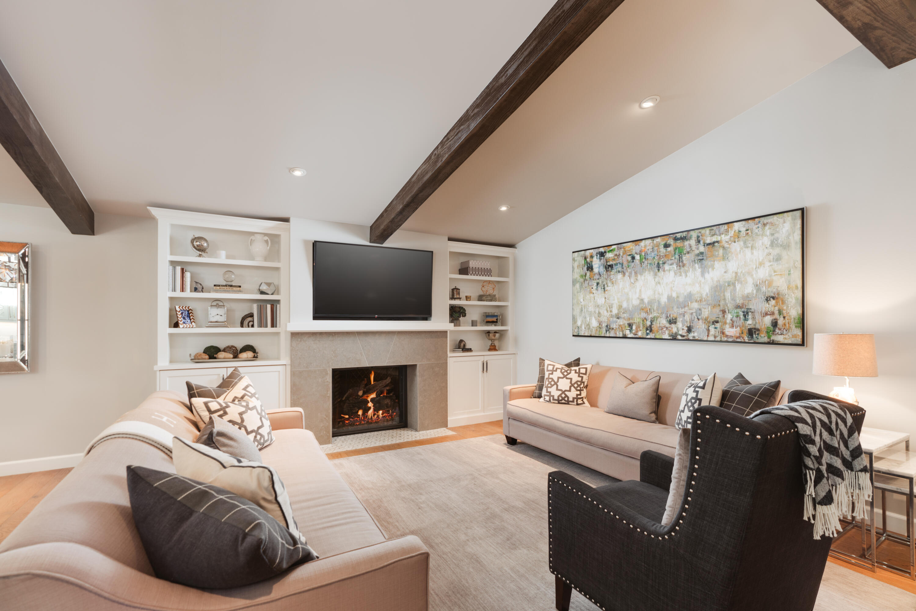 844 Meigs Road Santa Barbara, CA 93109 - Photo 3 of 32 a living room with furniture fireplace and a flat screen tv