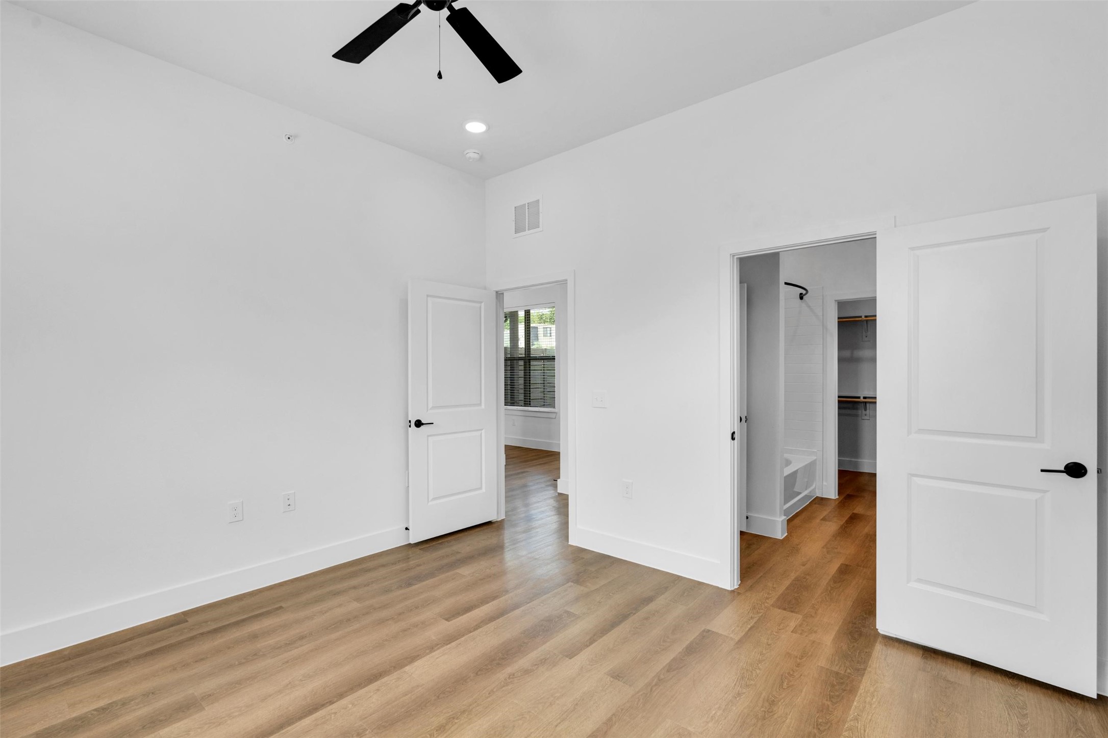 1335 Goalie Drive Little Elm, TX 75068 - Photo 9 of 27 an empty room with closet and windows