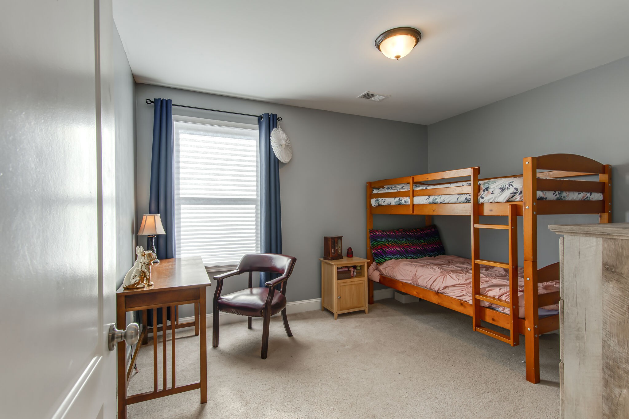 357 Flora Maxwell Road Nashville, TN 37211 - Photo 20 of 31 a bedroom with furniture and a window
