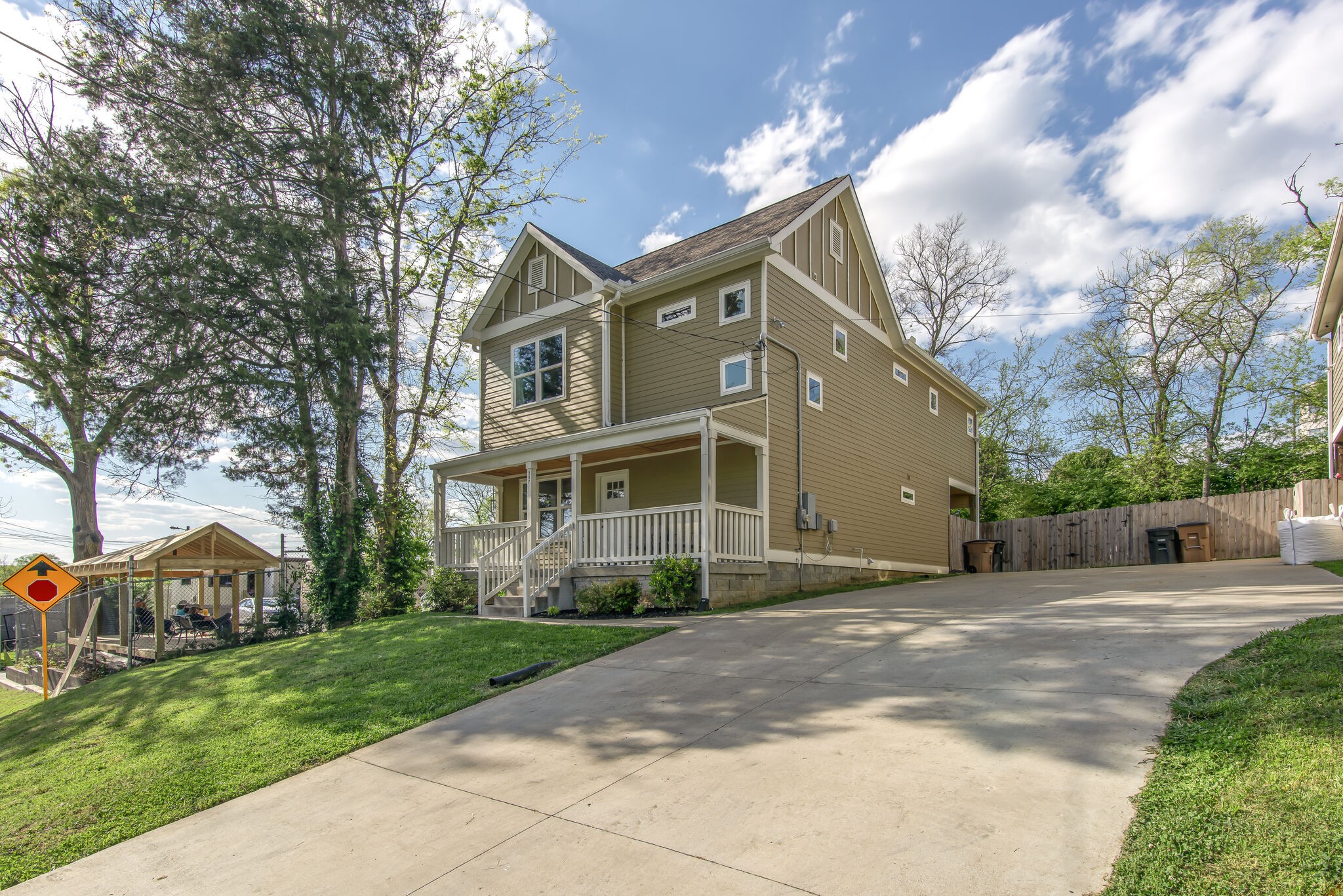 357 Flora Maxwell Road Nashville, TN 37211 - Photo 3 of 31 a front view of a house with a garden