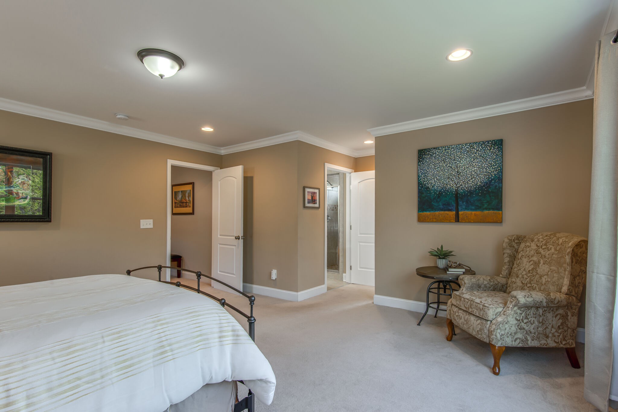 357 Flora Maxwell Road Nashville, TN 37211 - Photo 25 of 31 a bedroom with a bed and a couch