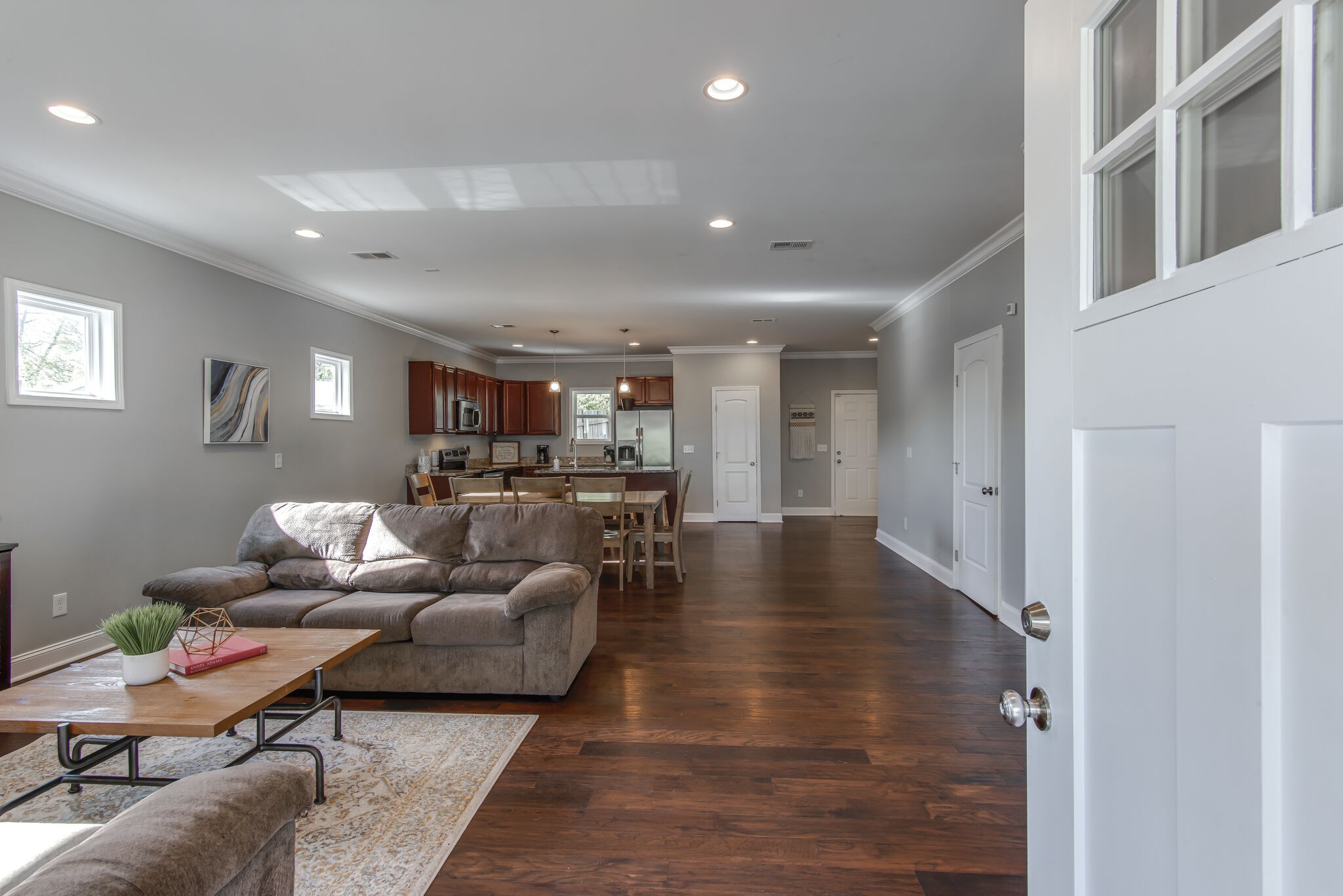 357 Flora Maxwell Road Nashville, TN 37211 - Photo 4 of 31 a living room with furniture and a table