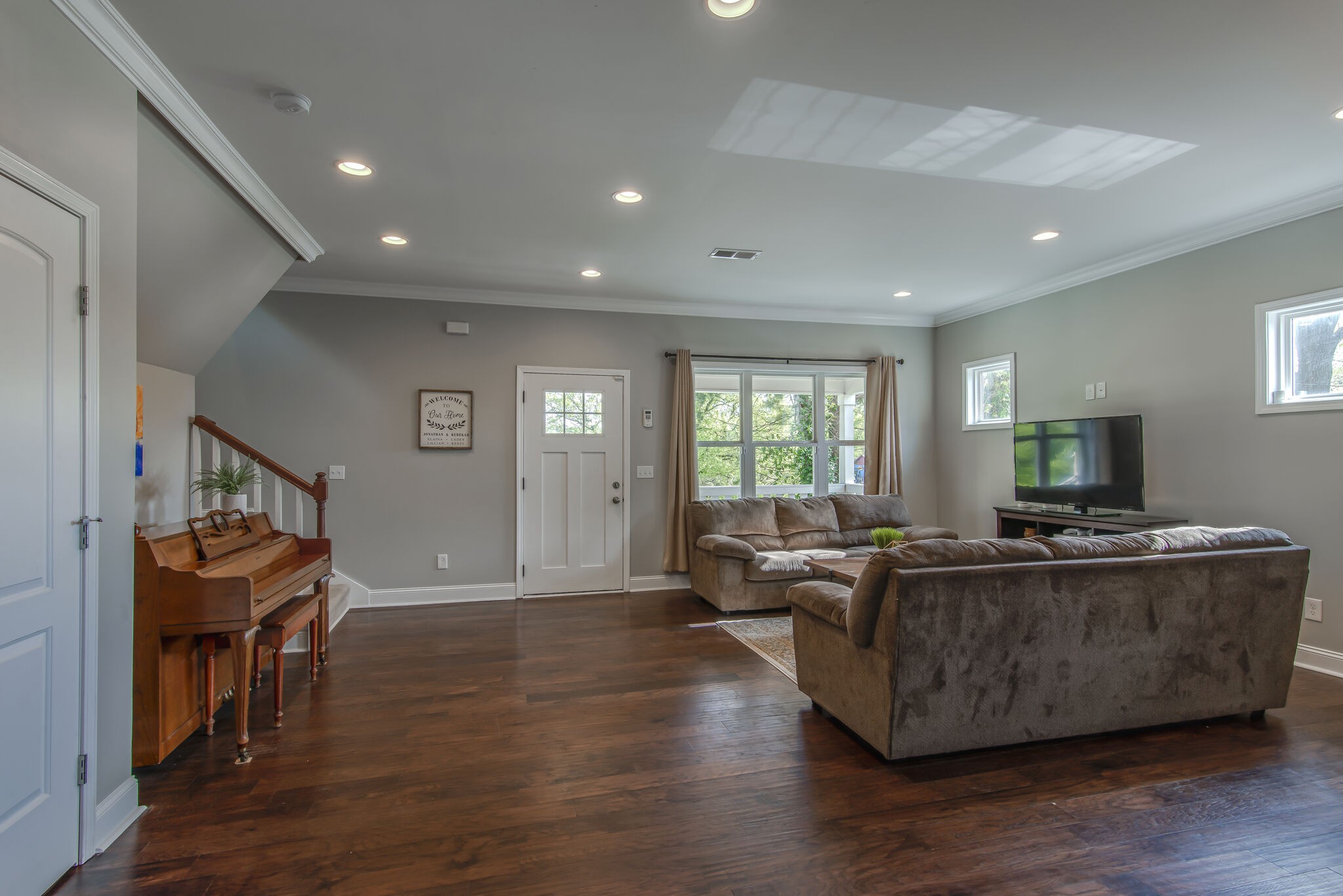 357 Flora Maxwell Road Nashville, TN 37211 - Photo 7 of 31 a living room with fireplace furniture and a flat screen tv