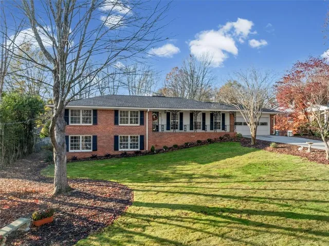 a view of a house with a swimming pool