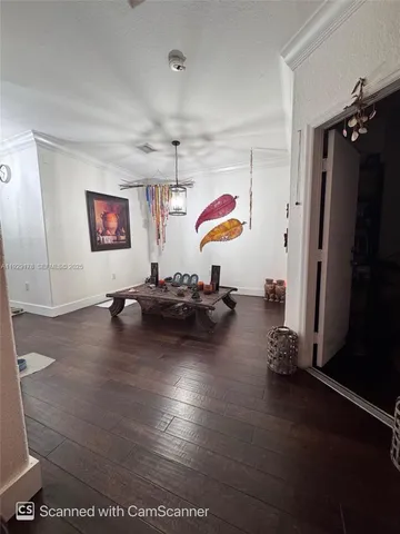 an empty room with gym equipment and a window