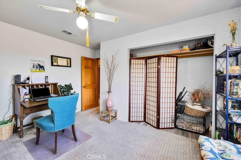 10341 Pinon Avenue Morongo Valley, CA 92256 - Photo 29 of 68 a living room with furniture and a window