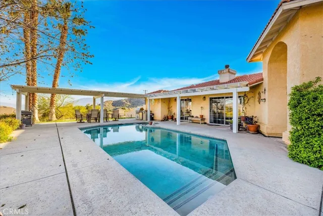 a view of a terrace with a garden
