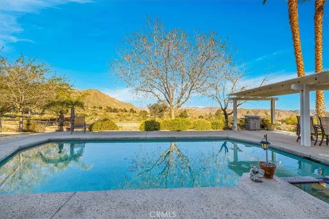 a view of a town with mountains in the background