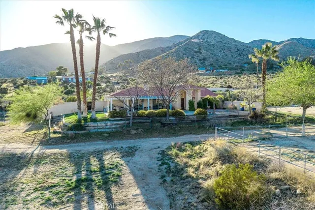 a view of a city with mountains in the background
