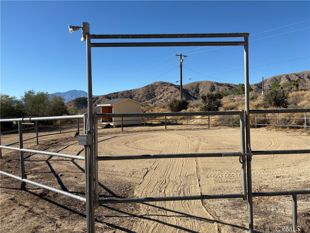 10341 Pinon Avenue Morongo Valley, CA 92256 - Photo 52 of 68 a view of a balcony with a potted plant