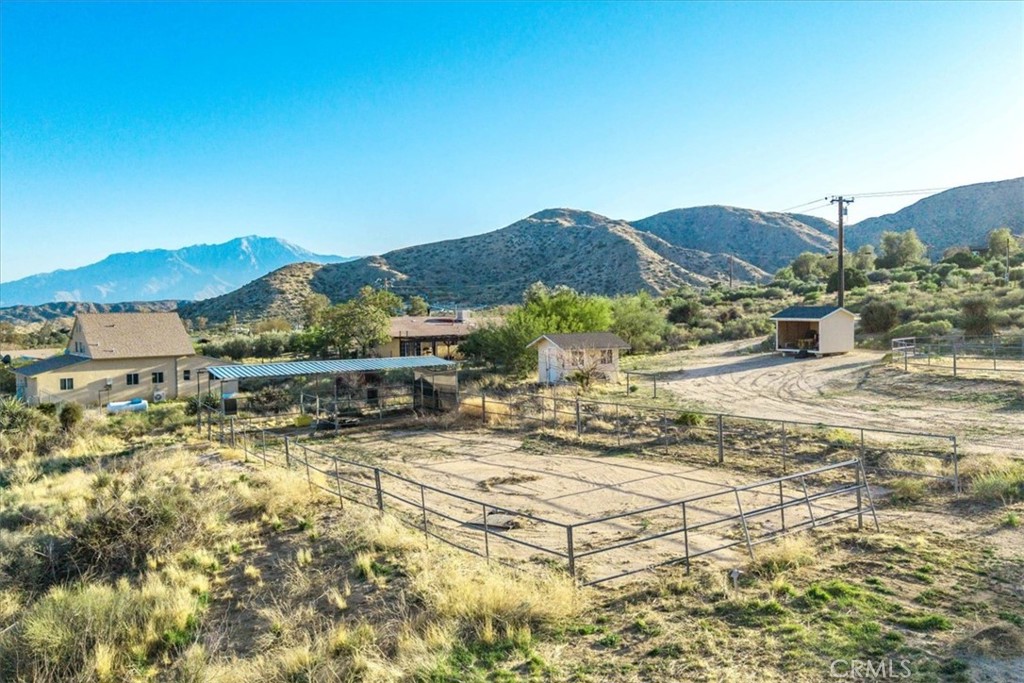 10341 Pinon Avenue Morongo Valley, CA 92256 - Photo 57 of 68 a view of a houses with a yard