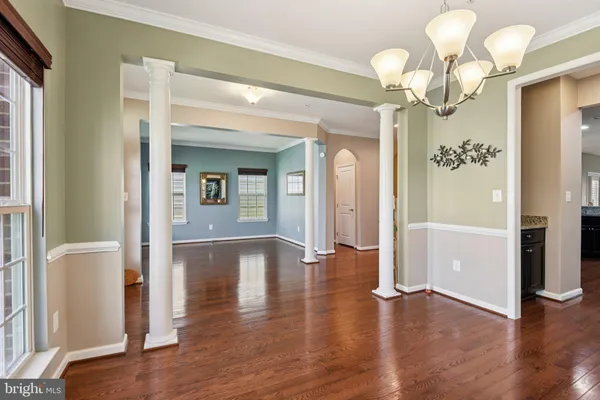a view of livingroom with furniture and wooden floor