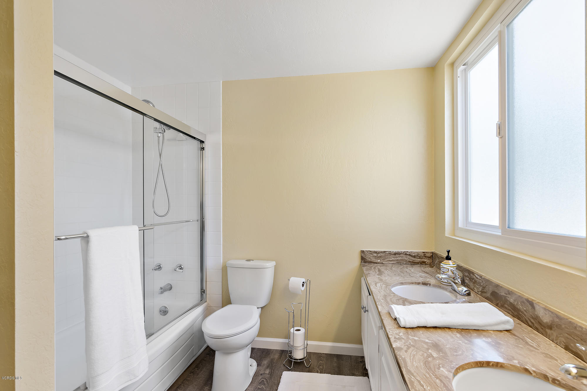 2551 Fitzgerald Road Simi Valley, CA 93065 - Photo 13 of 17 a bathroom with a granite countertop sink toilet and shower