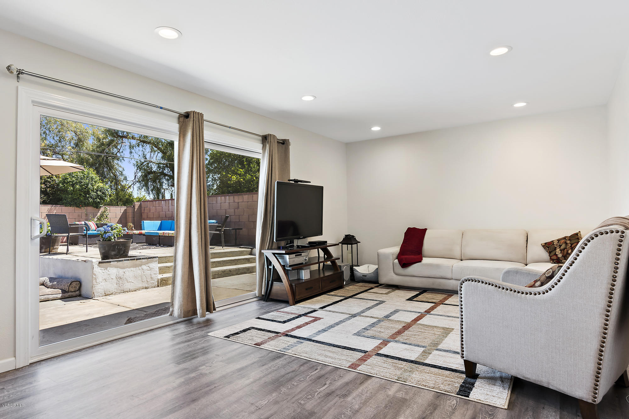 2551 Fitzgerald Road Simi Valley, CA 93065 - Photo 5 of 17 a living room with furniture and a flat screen tv