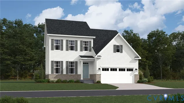 a view of a white house next to a yard