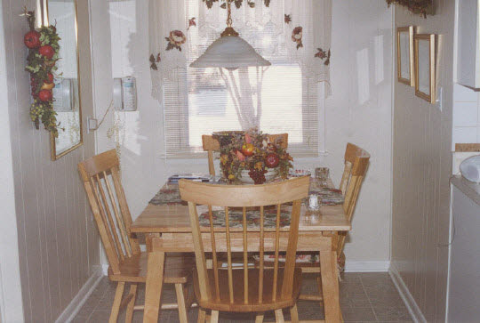 1030 North Alpine Road Rockford, IL 61107 - Photo 2 of 5 a view of a dining room with furniture and window
