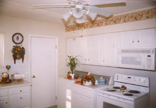 1030 North Alpine Road Rockford, IL 61107 - Photo 3 of 5 a kitchen with a sink and cabinets
