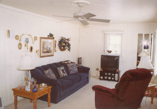 1030 North Alpine Road Rockford, IL 61107 - Photo 4 of 5 a living room with furniture a couch and a piano