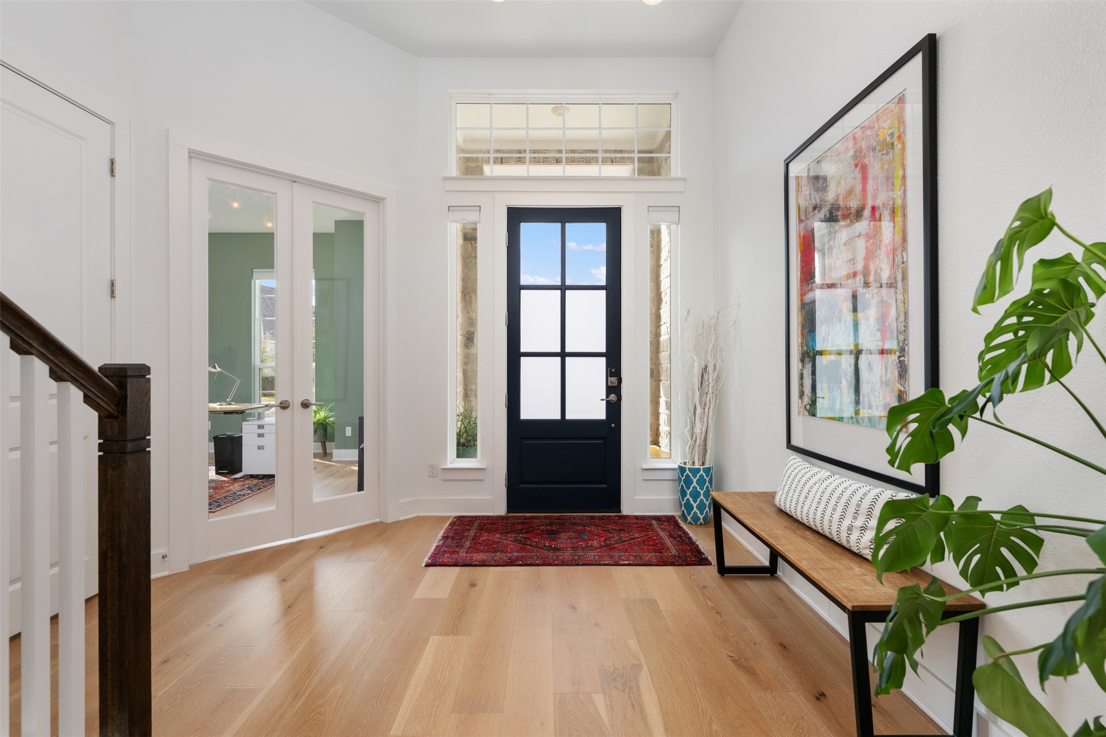 438 Pear Tree Lane Austin, TX 78737 - Photo 4 of 40 Entrance foyer with french doors to office and light wood finished floors