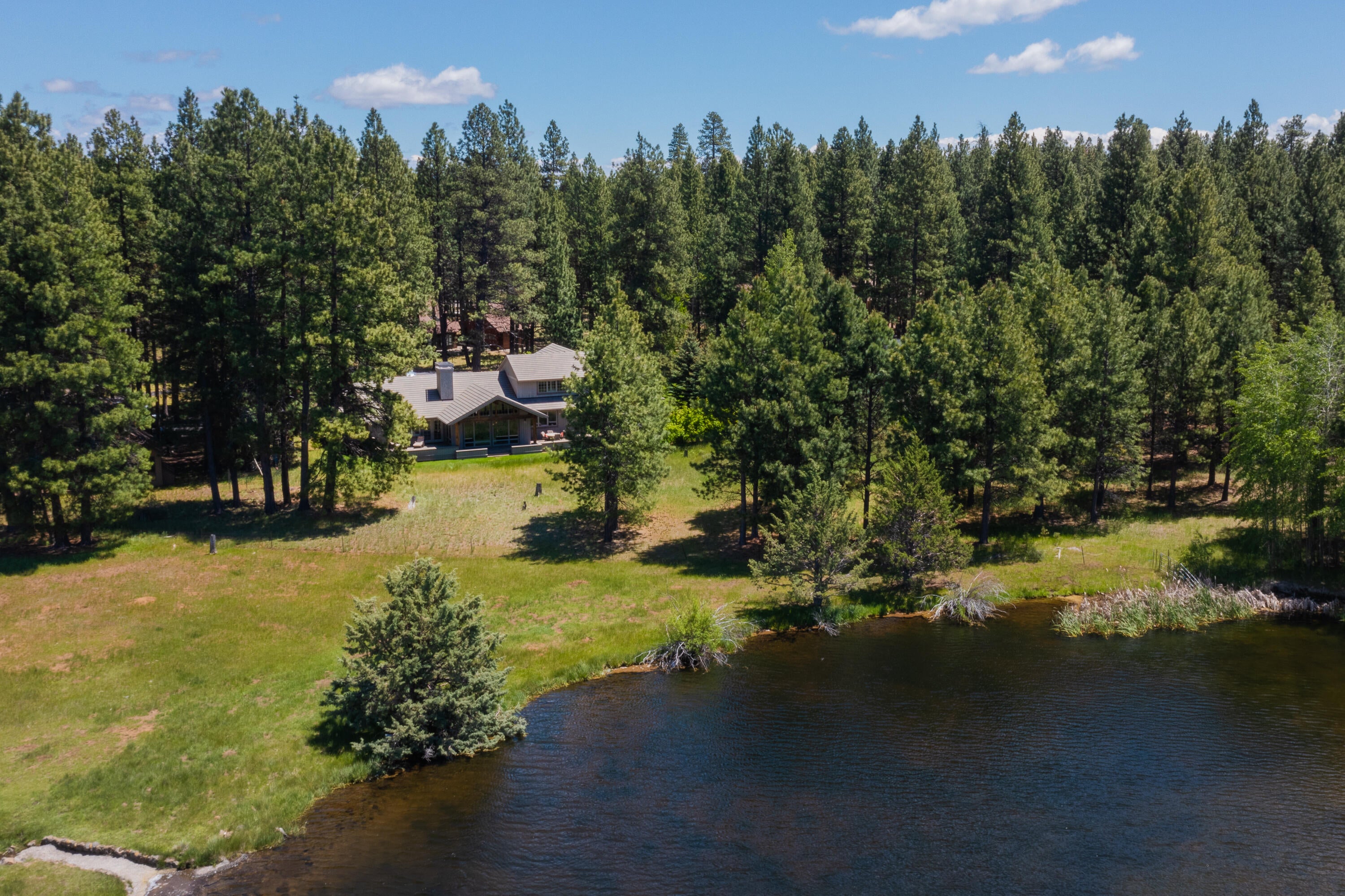 70331 Willow Herb, Unit GM205 Black Butte Ranch, OR 97759 - Photo 8 of 75 Overhead of lake, meadow and home
