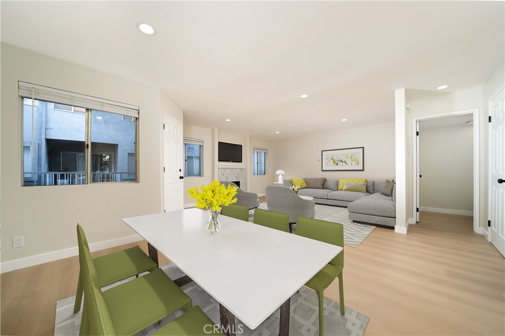 1067 252nd Street, Unit 7 Harbor City, CA 90710 - Photo 2 of 23 a living room with furniture and view of kitchen
