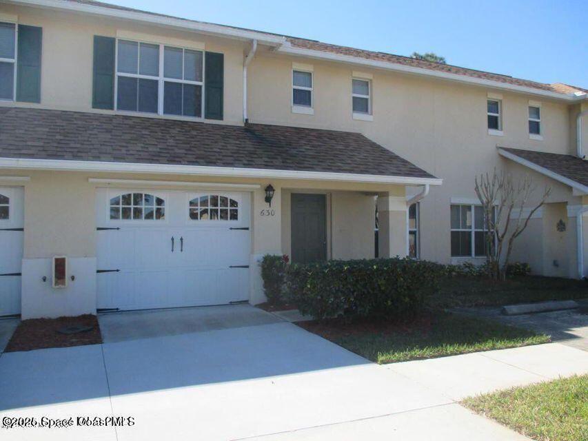 630 Cedar Side Circle Northeast Palm Bay, FL 32905 - Photo 2 of 17 a view of a building