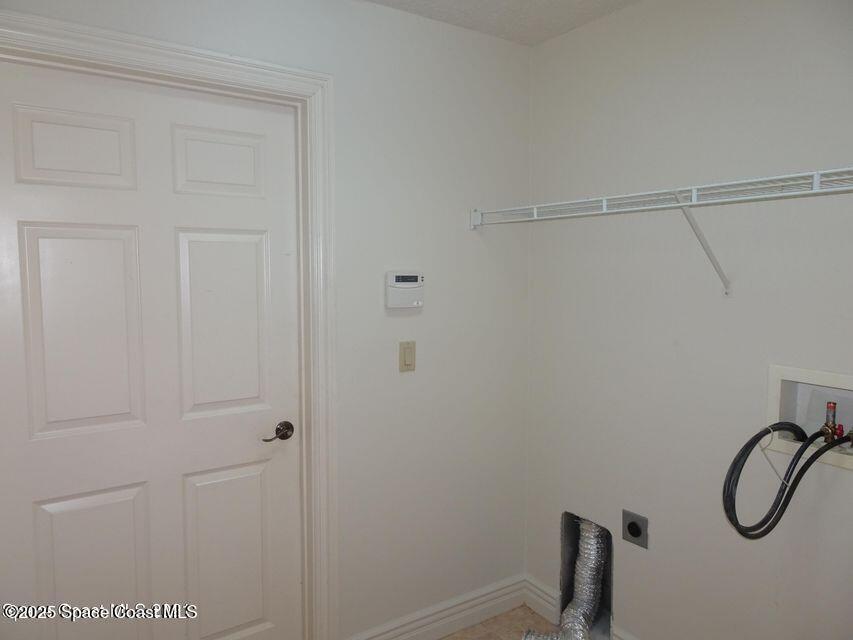 630 Cedar Side Circle Northeast Palm Bay, FL 32905 - Photo 7 of 17 a bathroom with a shower