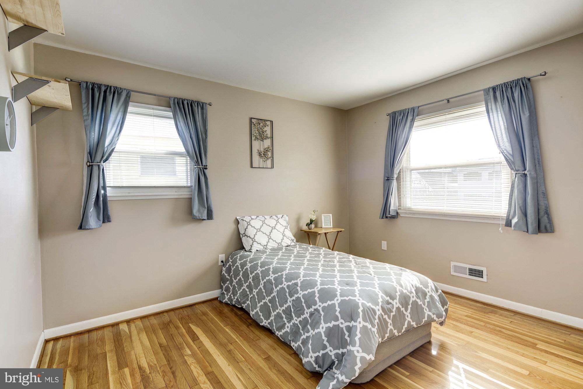 6104 Moorefield Road Catonsville, MD 21228 - Photo 20 of 30 Second bedroom with hardwood floors