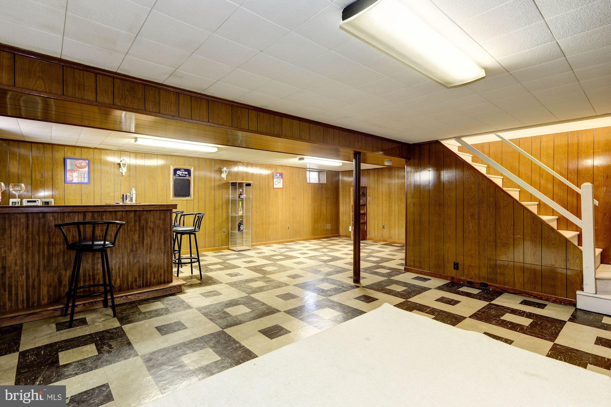 6104 Moorefield Road Catonsville, MD 21228 - Photo 25 of 30 Finished lower level Rec Room with bar