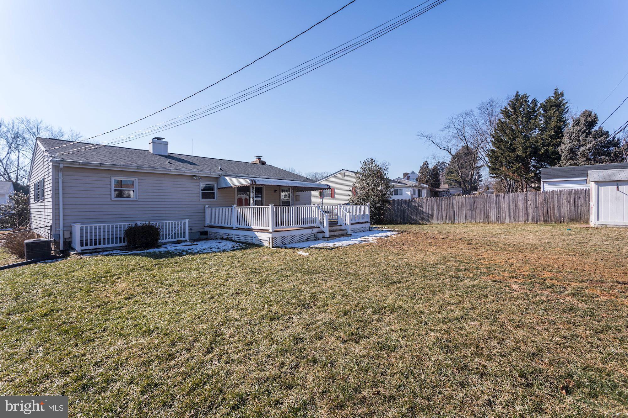 6104 Moorefield Road Catonsville, MD 21228 - Photo 29 of 30 Composite deck overlooks large fenced backyard