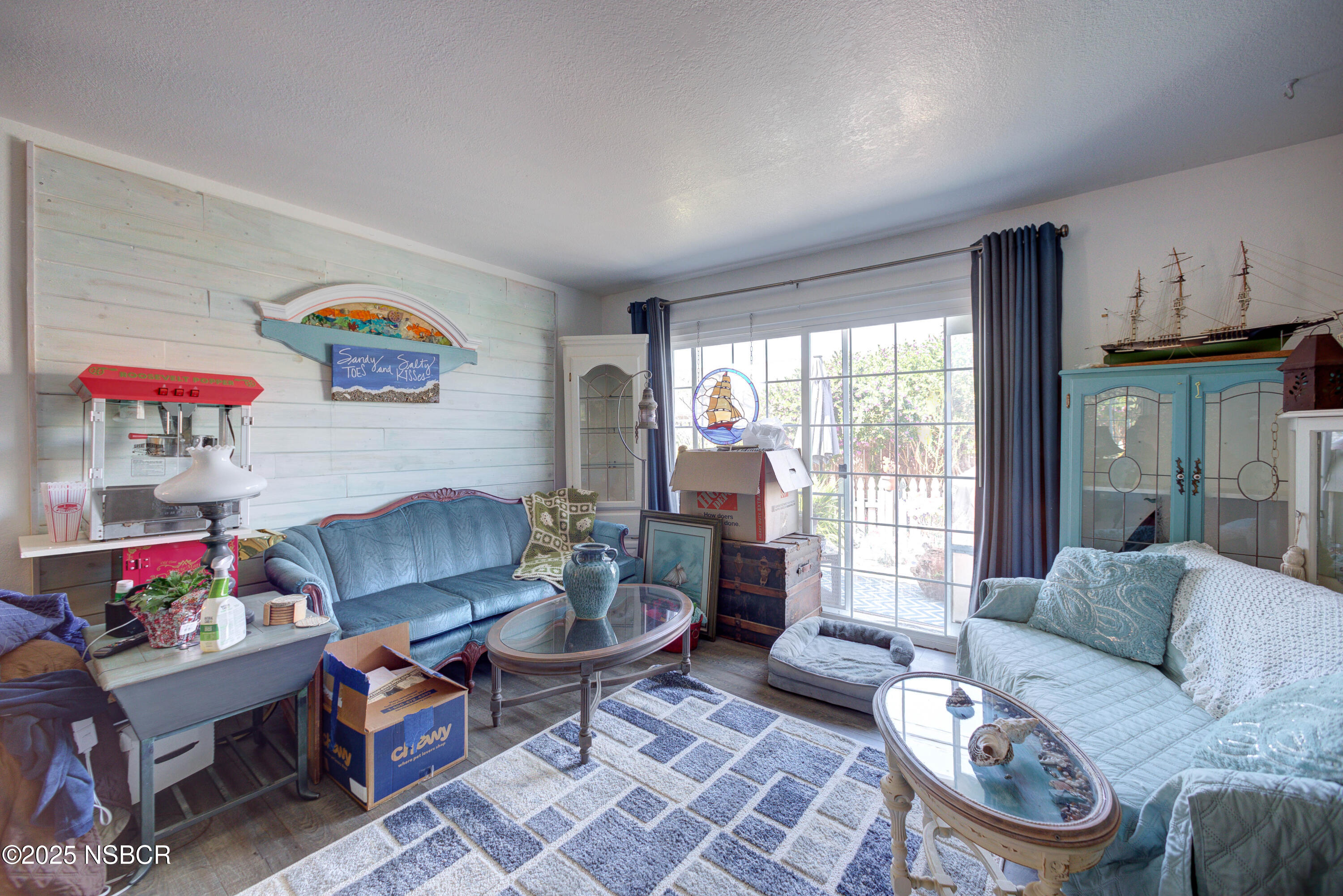 421 South O Place Lompoc, CA 93436 - Photo 4 of 12 a living room with furniture and a large window