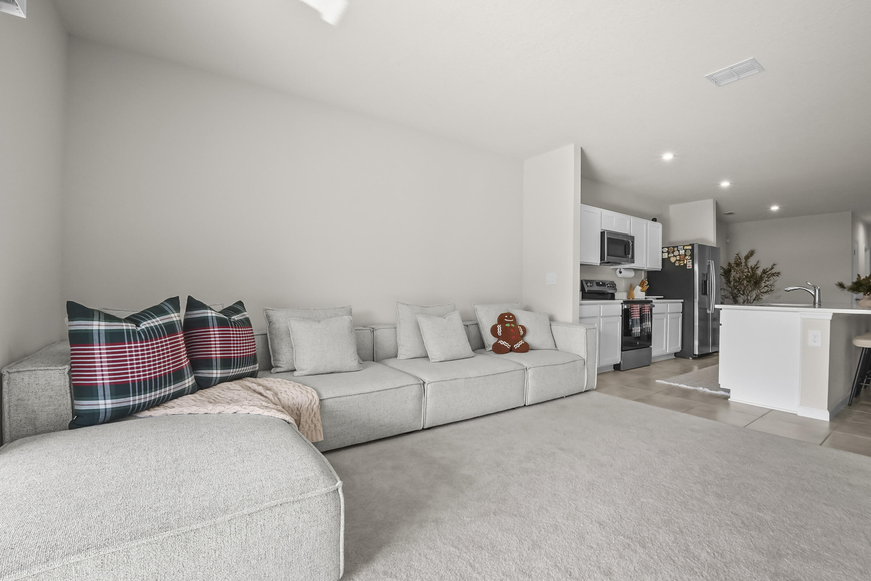 309 Raspberry Road Fort Pierce, FL 34981 - Photo 12 of 38 a living room with furniture