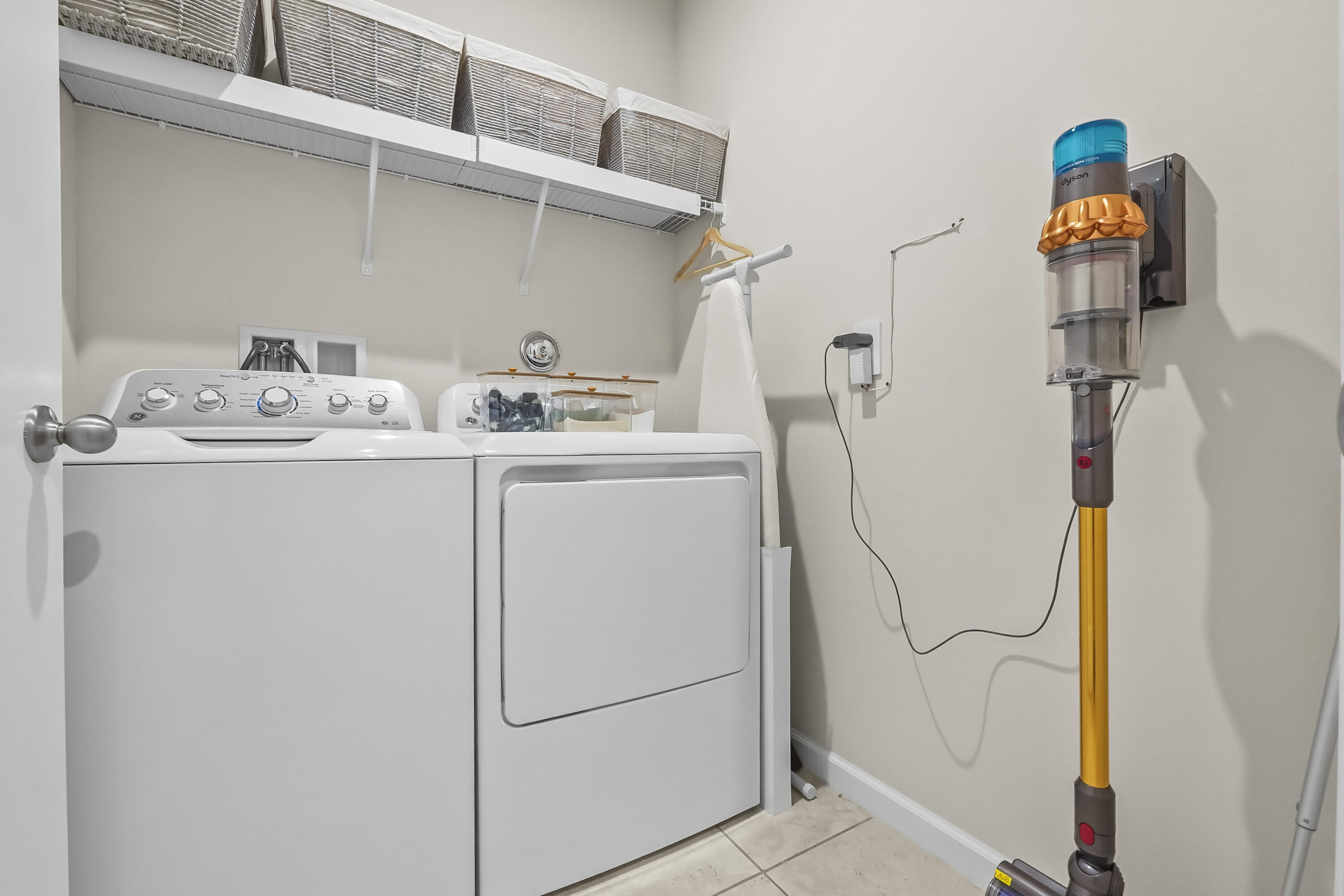 309 Raspberry Road Fort Pierce, FL 34981 - Photo 14 of 38 a utility room with dryer and washer