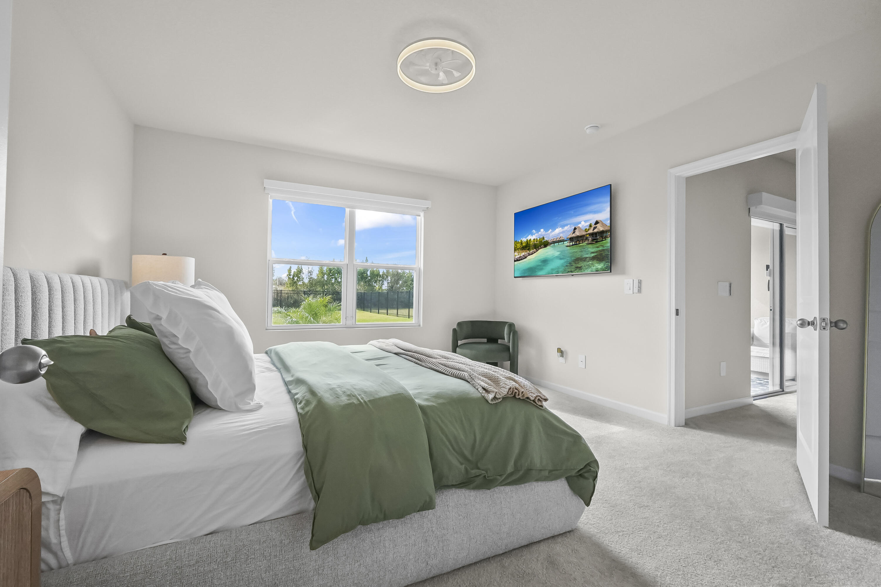 309 Raspberry Road Fort Pierce, FL 34981 - Photo 23 of 38 a bedroom with a bed and a window