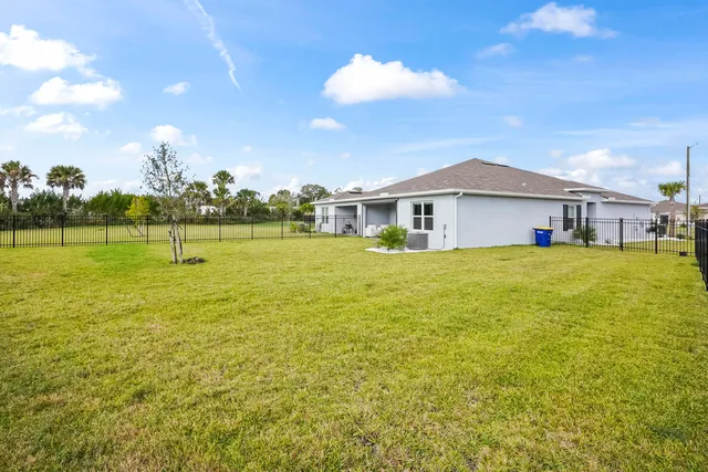 a view of a house with a big yard