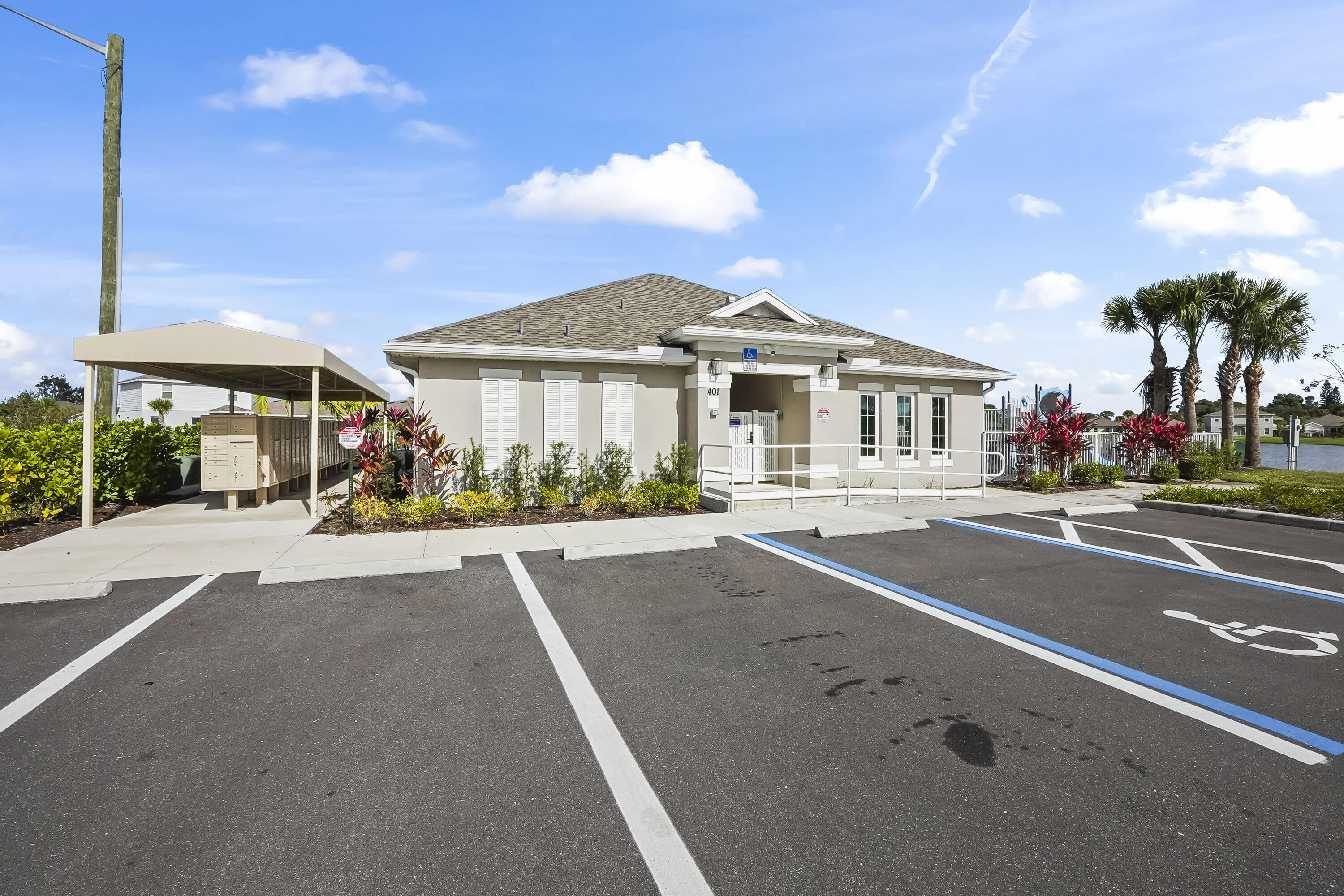 309 Raspberry Road Fort Pierce, FL 34981 - Photo 35 of 38 a front view of a house with a garden